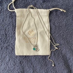 Silver adjustable length kendra scott necklace with two removable charms